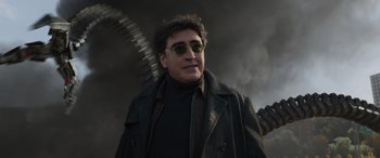 Movie still from “Spider-Man: No Way Home” (2021), directed by Jon Watts – A man in a black jacket and sunglasses; Close Up shot, Low angle