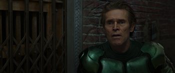 Movie still from “Spider-Man: No Way Home” (2021), directed by Jon Watts – Willem dafoe in a scene from the film; Close Up shot, Over the shoulder angle