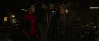Movie still from “Spider-Man: No Way Home” (2021), directed by Jon Watts – Two people standing next to each other in a room; Medium shot, Over the shoulder angle