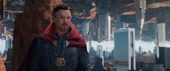 Movie still from “Spider-Man: No Way Home” (2021), directed by Jon Watts – A person with a medal around his neck; Close Up shot, Over the shoulder angle