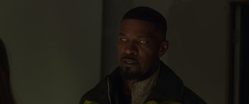 Movie still from “Spider-Man: No Way Home” (2021), directed by Jon Watts – A person wearing a jacket; Close Up shot, Over the shoulder angle