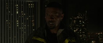 Movie still from “Spider-Man: No Way Home” (2021), directed by Jon Watts – A person wearing a jacket; Close Up shot, Over the shoulder angle