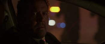 Movie still from “Spider-Man: No Way Home” (2021), directed by Jon Watts – A person in a car at night; Close Up shot, Low angle