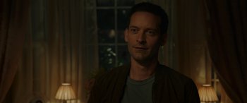 Movie still from “Spider-Man: No Way Home” (2021), directed by Jon Watts – A person in a room near a window; Close Up shot, Over the shoulder angle