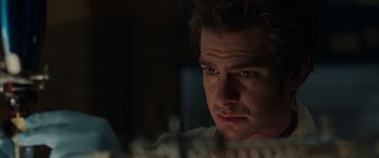 Movie still from “Spider-Man: No Way Home” (2021), directed by Jon Watts – A person looking at a computer screen; Close Up shot, Low angle