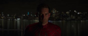 Movie still from “Spider-Man: No Way Home” (2021), directed by Jon Watts – A person wearing a spider man costume; Close Up shot, Over the shoulder angle