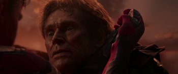 Movie still from “Spider-Man: No Way Home” (2021), directed by Jon Watts – A man's face in a dark room; Close Up shot, Over the shoulder angle