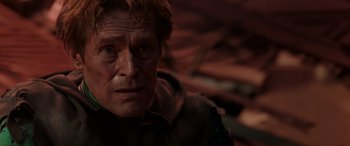 Movie still from “Spider-Man: No Way Home” (2021), directed by Jon Watts – A person wearing a jacket and looking at the camera; Close Up shot, High angle