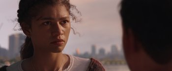 Movie still from “Spider-Man: No Way Home” (2021), directed by Jon Watts – A person looking at the camera; Close Up shot, Over the shoulder angle