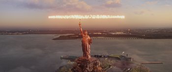 Movie still from “Spider-Man: No Way Home” (2021), directed by Jon Watts – An aerial view of the statue of liberty in new york city; Extreme Wide shot, High angle