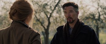 Movie still from “Spider-Man: No Way Home” (2021), directed by Jon Watts – A man and a woman talking in a park; Close Up shot, Over the shoulder angle