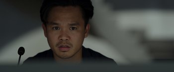 Movie still from “Spiderhead” (2022), directed by Joseph Kosinski – A man's face in front of a mirror; Close Up shot, Low angle