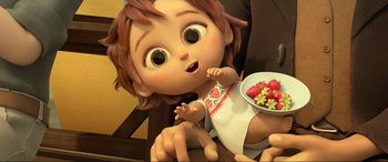 Movie still from “Spirit Untamed” (2021), directed by Ennio Torresan – An animated baby holding a bowl of strawberries; Medium shot, High angle