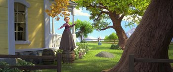 Movie still from “Spirit Untamed” (2021), directed by Ennio Torresan – An animated woman standing on top of a wooden barrel; Wide shot, Low angle