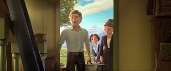 Movie still from “Spirit Untamed” (2021), directed by Ennio Torresan – A man and a woman standing next to a small child; Medium shot, Over the shoulder angle