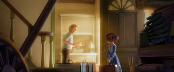 Movie still from “Spirit Untamed” (2021), directed by Ennio Torresan – A man and a woman standing next to each other in a room; Medium shot, Over the shoulder angle