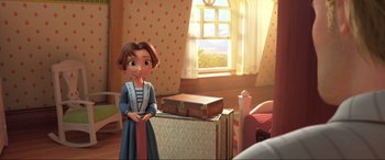 Movie still from “Spirit Untamed” (2021), directed by Ennio Torresan – A girl is standing in a room with a suitcase; Wide shot, Over the shoulder angle