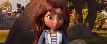 Movie still from “Spirit Untamed” (2021), directed by Ennio Torresan – A girl with long red hair is looking at the camera; Close Up shot, Over the shoulder angle