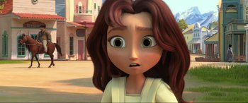 Movie still from “Spirit Untamed” (2021), directed by Ennio Torresan – A cartoon girl with brown hair and brown eyes looking surprised; Close Up shot, Over the shoulder angle