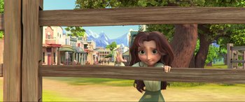 Movie still from “Spirit Untamed” (2021), directed by Ennio Torresan – An animated woman is looking through a fence; Medium shot, Low angle