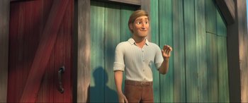 Movie still from “Spirit Untamed” (2021), directed by Ennio Torresan – A cartoon of a man standing in front of a wooden wall; Medium shot, Over the shoulder angle
