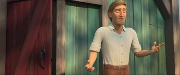 Movie still from “Spirit Untamed” (2021), directed by Ennio Torresan – A cartoon of a man holding his hand out to someone; Medium shot, Low angle