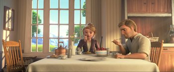 Movie still from “Spirit Untamed” (2021), directed by Ennio Torresan – A girl eating a bowl of fruit at a table with her friends; Medium shot, High angle