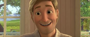 Movie still from “Spirit Untamed” (2021), directed by Ennio Torresan – A man with a big smile on his face; Close Up shot, Low angle