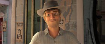 Movie still from “Spirit Untamed” (2021), directed by Ennio Torresan – A man wearing a hat and a striped shirt; Close Up shot, High angle