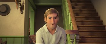 Movie still from “Spirit Untamed” (2021), directed by Ennio Torresan – A man with long blonde hair is sitting on the stairs; Close Up shot, Low angle