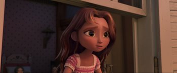 Movie still from “Spirit Untamed” (2021), directed by Ennio Torresan – A girl with brown hair and a pink dress; Close Up shot, Over the shoulder angle