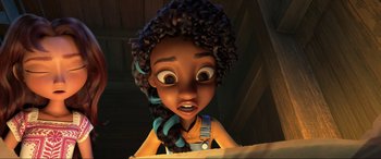 Movie still from “Spirit Untamed” (2021), directed by Ennio Torresan – A cartoon girl with long black hair is looking at the camera; Close Up shot, Overhead angle