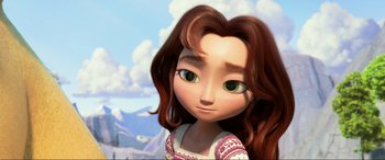 Movie still from “Spirit Untamed” (2021), directed by Ennio Torresan – A girl's face with mountains in the background; Close Up shot, Low angle