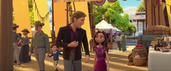 Movie still from “Spirit Untamed” (2021), directed by Ennio Torresan – A man and a woman are standing next to each other; Medium shot, Over the shoulder angle