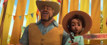 Movie still from “Spirit Untamed” (2021), directed by Ennio Torresan – A man and a woman are standing next to each other; Medium shot, Low angle