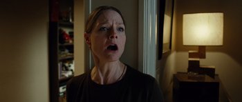 Movie still from “Carnage” (2011), directed by Roman Polanski – A person with her mouth wide open; Close Up shot, Low angle