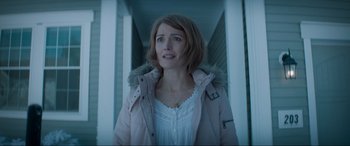 Movie still from “Spirited” (2022), directed by Sean Anders – A woman in a white shirt and a pink jacket; Close Up shot, Low angle
