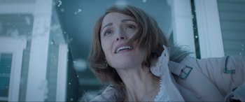 Movie still from “Spirited” (2022), directed by Sean Anders – A person looking up at the sky; Close Up shot, Low angle