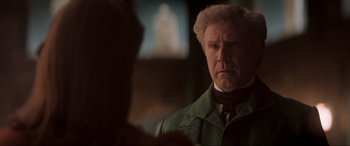 Movie still from “Spirited” (2022), directed by Sean Anders – An older man in a green jacket looking at a woman in a green jacket; Close Up shot, Over the shoulder angle