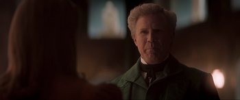 Movie still from “Spirited” (2022), directed by Sean Anders – An older man in a green jacket looking at the camera; Close Up shot, Over the shoulder angle