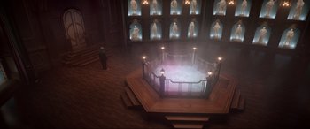 Movie still from “Spirited” (2022), directed by Sean Anders – A man standing in front of a boxing ring; Extreme Wide shot, High angle