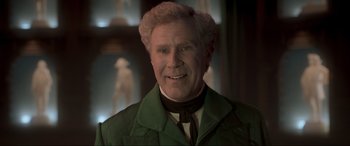 Movie still from “Spirited” (2022), directed by Sean Anders – An older man in a green jacket and a black tie; Close Up shot, Low angle