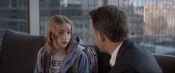 Movie still from “Spirited” (2022), directed by Sean Anders – A man and a girl are talking to each other; Medium shot, Over the shoulder angle