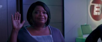 Movie still from “Spirited” (2022), directed by Sean Anders – A person wearing a dress; Close Up shot, Over the shoulder angle