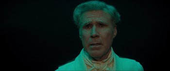 Movie still from “Spirited” (2022), directed by Sean Anders – An older man in a white shirt and tie; Close Up shot, Low angle