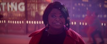Movie still from “Spirited” (2022), directed by Sean Anders – A person wearing a red jacket; Close Up shot, Over the shoulder angle