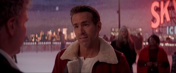 Movie still from “Spirited” (2022), directed by Sean Anders – A person wearing a red jacket; Close Up shot, Over the shoulder angle