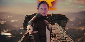 Movie still from “Spy Kids: Armageddon” (2023), directed by Robert Rodriguez – A man with a skull on his arm; Medium shot, Low angle