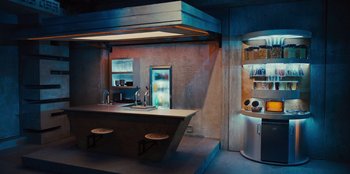 Movie still from “Spy Kids: Armageddon” (2023), directed by Robert Rodriguez – A kitchen with a sink , refrigerator , and a counter; Wide shot, High angle