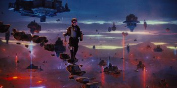Movie still from “Spy Kids: Armageddon” (2023), directed by Robert Rodriguez – An image of a man walking across a bridge in the middle of the night; Wide shot, Low angle